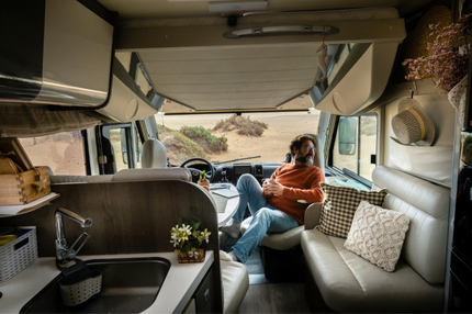 A man inside a 2026 motorhome with modern features